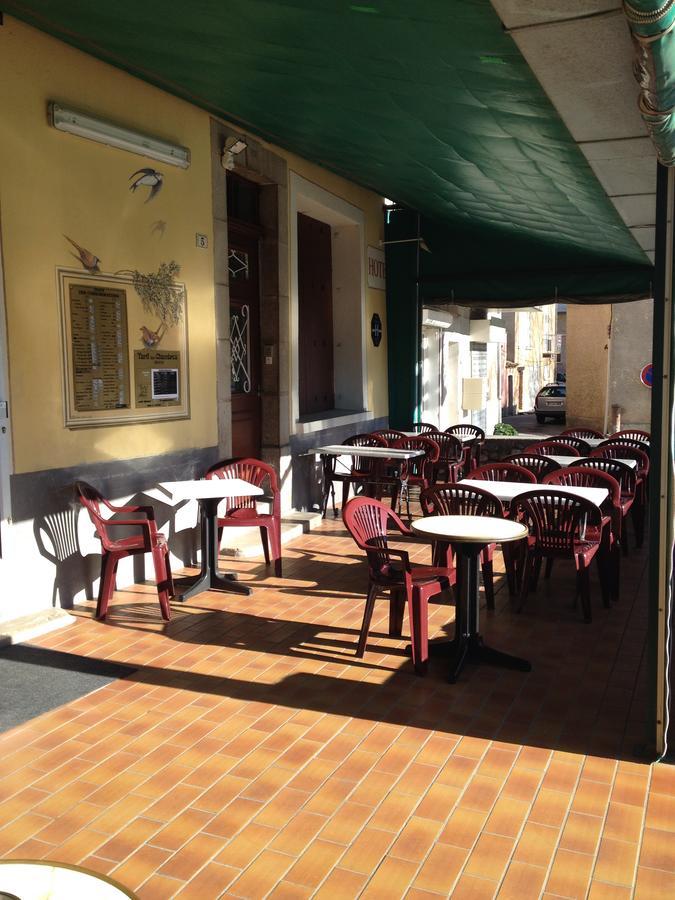 Bar Hotel De La Place Mezel Exterior foto