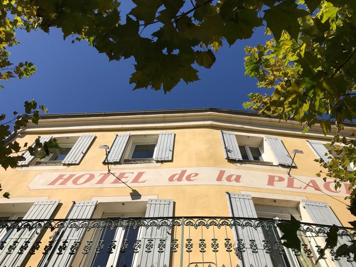 Bar Hotel De La Place Mezel Exterior foto
